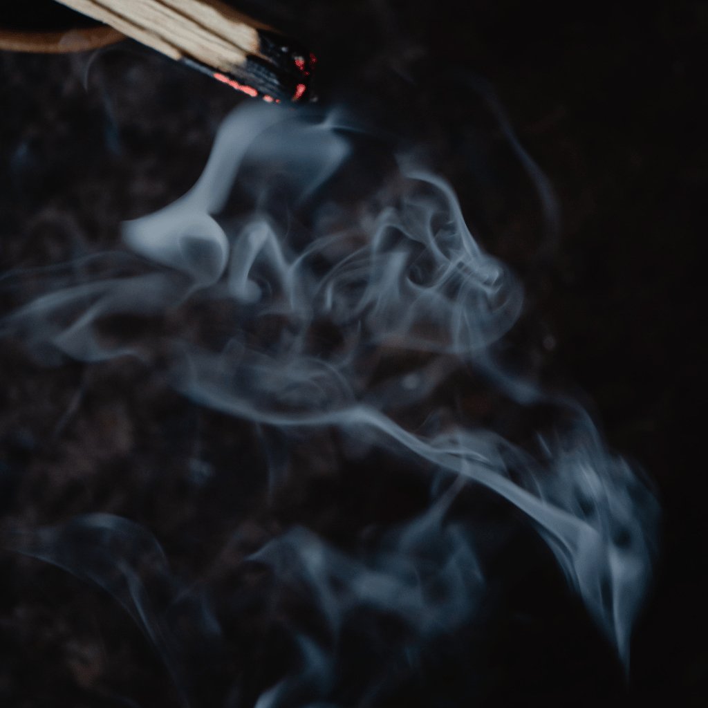smoke from palo santo incense stick