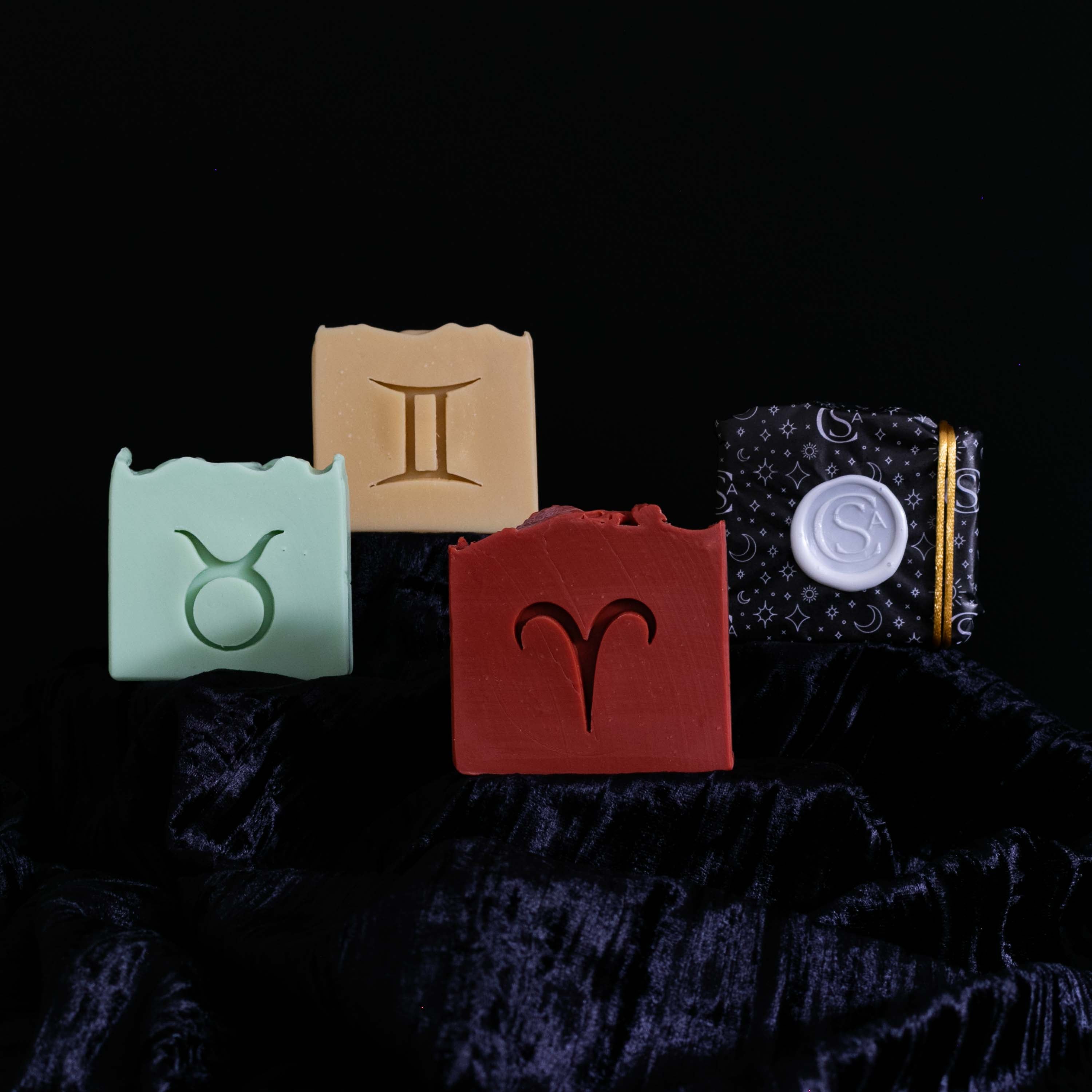 set of three astrology zodiac soaps with gift wrapped version displayed