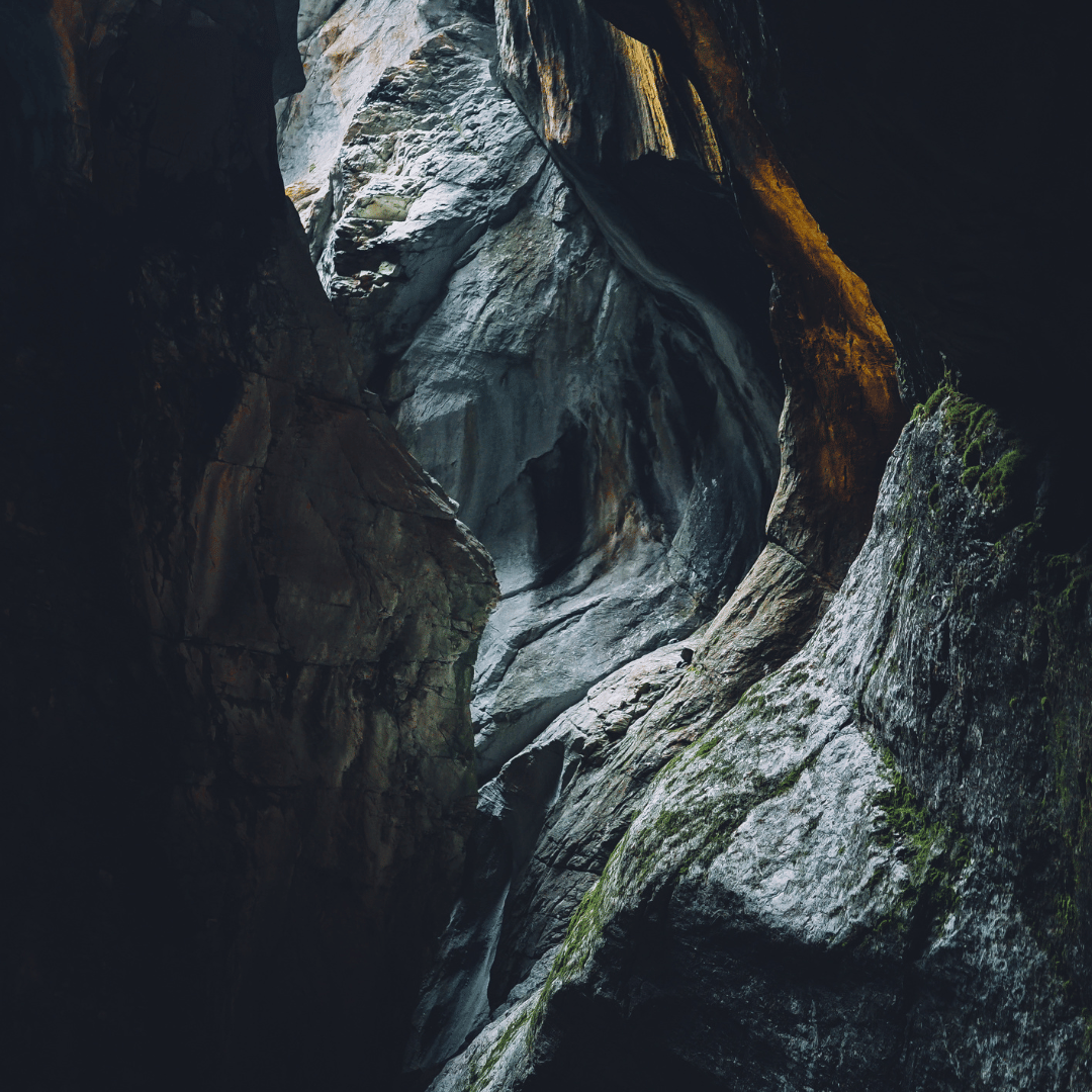 dark stone cave that beckons you in