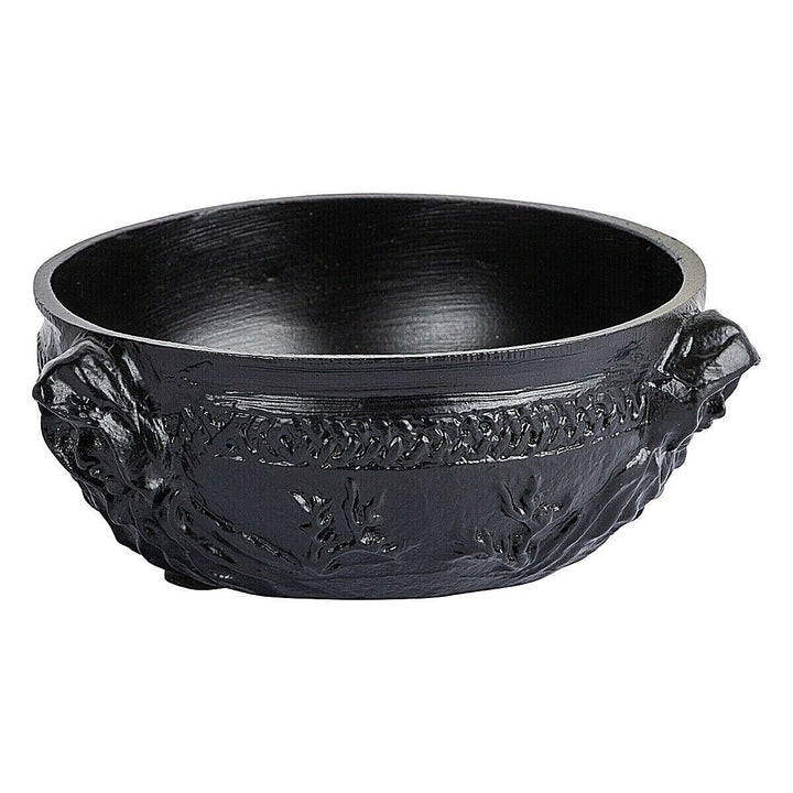 close up detail of glossy black triple goddess scrying bowl on white background