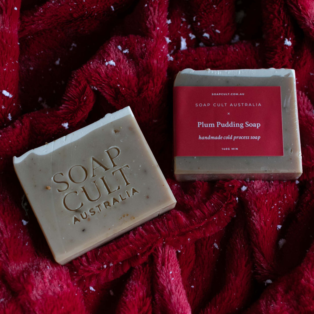 hazel and white soap on red velvet blanket with snow