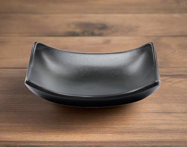 Curved Black Melamine Soap Dish on a wooden table